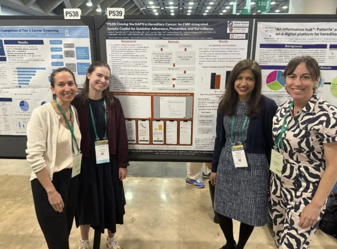 Team members at a genetics research conference